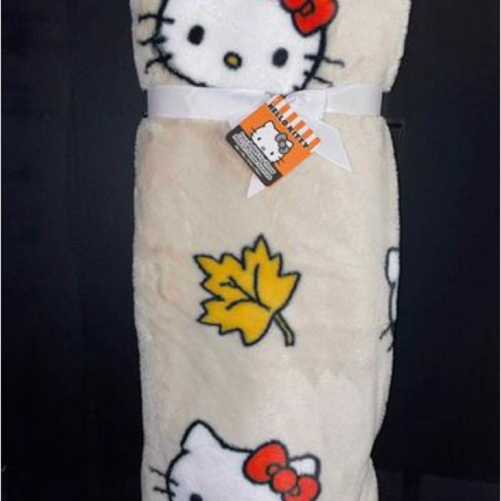 Hello Kitty Cream and Red Blanket